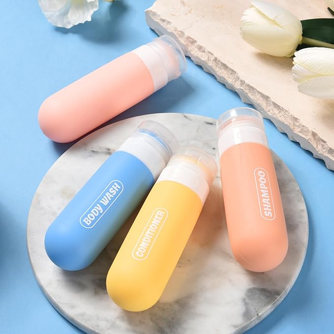 Silicone Travel Bottles for Toiletries with Labels, 3oz TSA Approved Squeezable Travel Size Containers, Leak Proof Travel Shampoo and Conditioner Bottles with Toiletry Bag (4 Pack, Light Color)